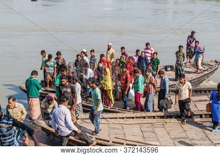 Khulna, Bangladesh - November 16, 2016: People Leave A Ferry On Rupsa River In Khulna, Bangladesh
