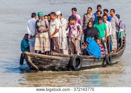 Khulna, Bangladesh - November 16, 2016: People On A Ferry On Rupsa River In Khulna, Bangladesh