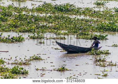 Balaswar, Bangladesh - November 19, 2016: Lone Man In A Canoe On Balaswar River, Bangladesh