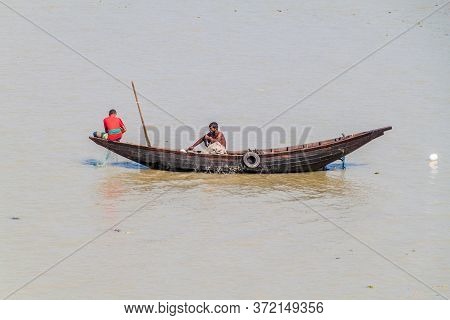 Katcha River, Bangladesh - November 19, 2016: Fishermen On A Small Boat On Katcha Kacha River, Bangl