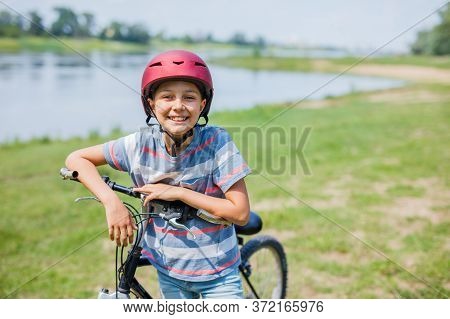 Little Boy On Board Of Sailing Yacht On Summer Cruise. Travel Adventure, Yachting With Child On Fami