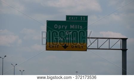 Direction Sign To Opry Mills On The Freeway - Nashville, Usa - June 17, 2019