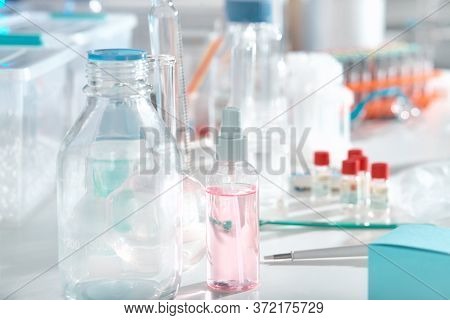 Scientific Background With Liquid Samples In Various Glass And Plastic Tubes. Rpr And Rt-pcr Test Ki