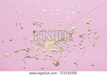 Pink Cardboard With Gold Potal Drops And Splashes. Creative Background