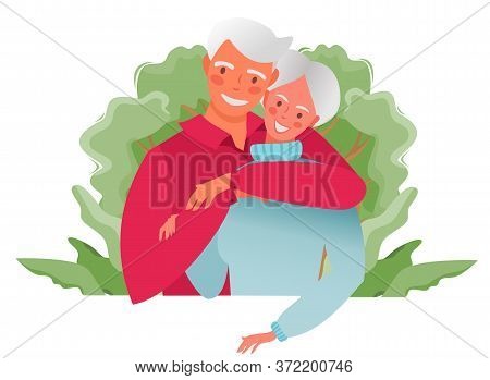 A Happy Family. An Elderly Couple Hugs Each Other. Grandfather And Grandmother In The Village. Trees