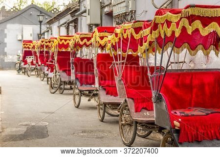 Many Typical Red Rickshaws In Beijing, China
