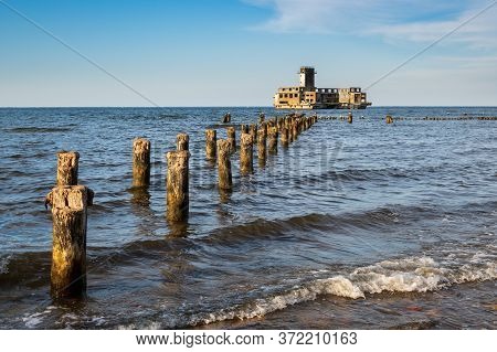 Breakwaters At Baltic Sea. The Old Torpedo Station In Babie Doly. Poland, Europe.