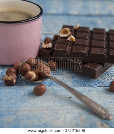Kraft Chocolate With Different Tastes And Aromatic Coffee On The Table