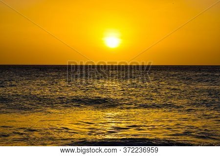 Sunset At Eagle Beach On Aruba Island In The Caribbean, Stunning Colours On A Blue Water