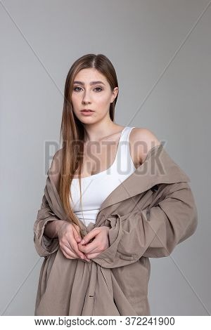 Attractive Caucasian Girl With Long Hair Looking At Camera. Beauty Portrait, Model Tests Of Pretty F