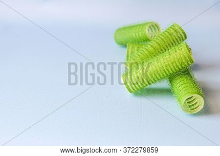 Hair Culers On The Blue Backround. Green Culers For Hairdress.