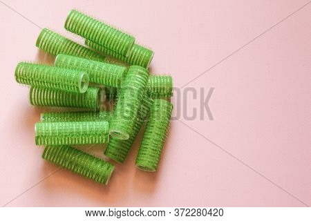 Hair Culers On The Pink Backround. Green Culers For Hairdress.