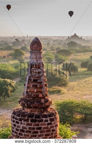 Detail Of Ta Wet Hpaya Temple In Bagan, Myanmar. Balloons Over Bagan Visible.