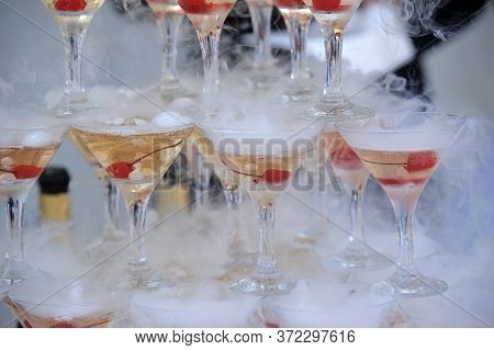 Pyramid Of Glasses With A Champagne Close Up.