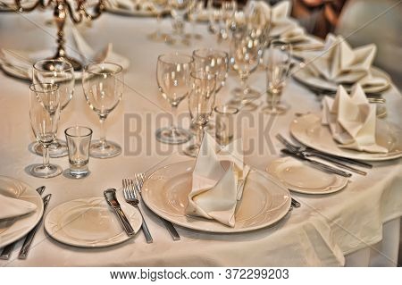 Table Serving With Carnations And Anemone Flowers