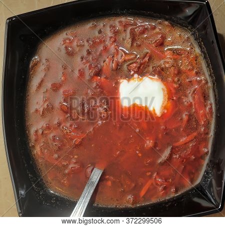 Ukrainian And Russian National Food - Red Beet Soup, Borscht . Close Up