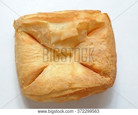 Fresh Appetizing Puff Pastry Bun On White Background