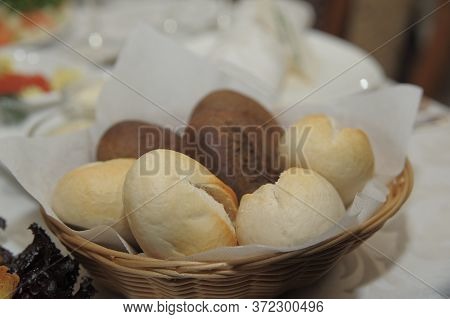Buns In A Basket On A Table
