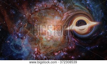 Supermassive Black Hole In The Universe. Elements Of This Image Furnished By Nasa