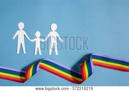 Homosexual Family. Different Kind Of Family. Paper Cut Family Simbol With Raindow Ribbon