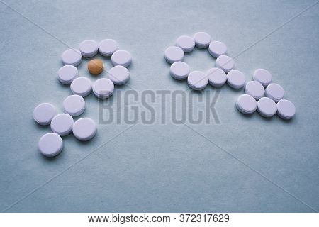Safe Relationship. Image Of Male And Female Symbols From White Round Pills Against Gray Background, 