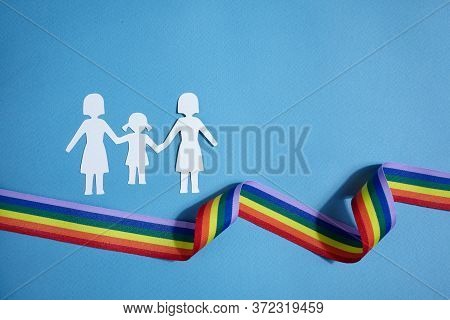Homosexual Family. Different Kind Of Family. Paper Cut Family Simbol With Raindow Ribbon