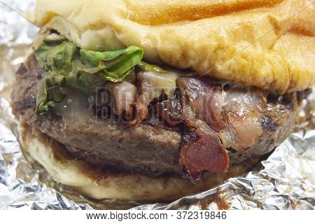 Padded Sandwich With Burger And Cheese Salad With Foil