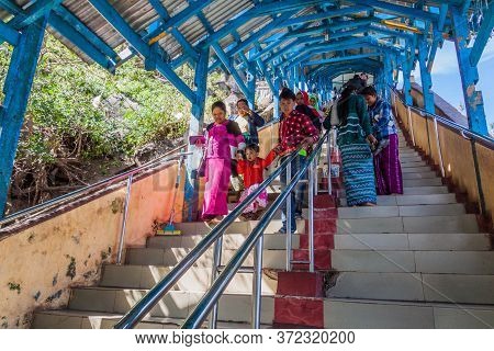 Mt Popa, Myanmar - December 8, 2016: People At The Stairway To Mt Popa, Myanmar