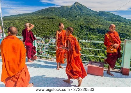 Mt Popa, Myanmar - December 8, 2016: Young Buddhist Monks At Mt Popa Temple, Myanmar