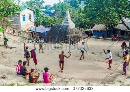 Mt Kyaiktiyo, Myanmar - December 11, 2016: Local People Playing A Traditional Game Chinlone Caneball