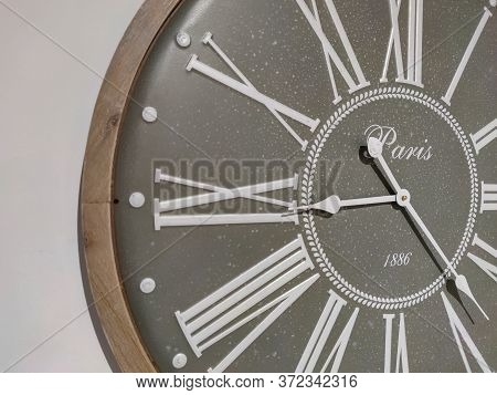 A Classical Clock Hanging On The Wall