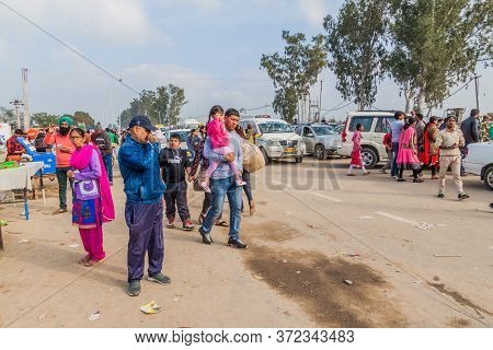 Wagah, India - January 26, 2017: People Walk To The Border To Watch The Military Ceremony At India-p