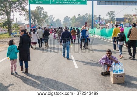 Wagah, India - January 26, 2017: People Walk To The Border To Watch The Military Ceremony At India-p