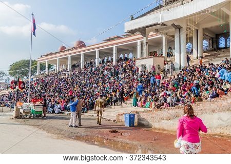Wagah, India - January 26, 2017: Indian Spectators Watch The Military Ceremony At India-pakistan Bor