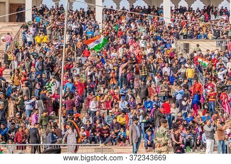 Wagah, India - January 26, 2017: Spectators Watch The Military Ceremony At India-pakistan Border In 