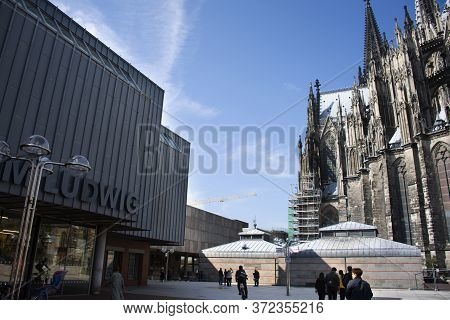 View Landscape Modern Buildings And German People And Foreign Travelers Walking Go To Cologne Cathed