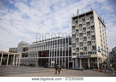 German And Foreigner Travelers Walking Near Koln Or Kolne Central Hauptbahnhof Railway Station With