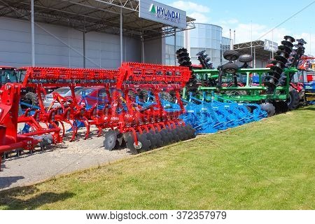 Kyiv, Ukraine - June 16, 2020: Large Disc Plough Unlu, Towing For Tractors To Plow Fields, Against T