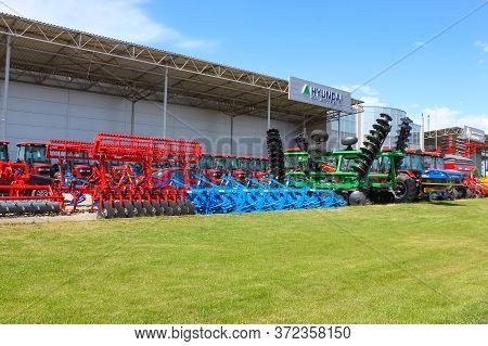 Kyiv, Ukraine - June 16, 2020: Tractor And Unia Cultivator On The Land For Minimum-tillage Technolog