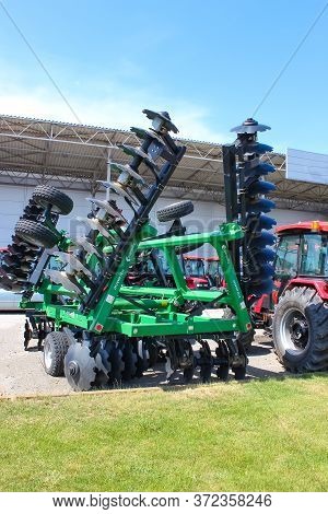 Kyiv, Ukraine - June 16, 2020: Large Disc Plough Martlet, Towing For Tractors To Plow Fields, Agains