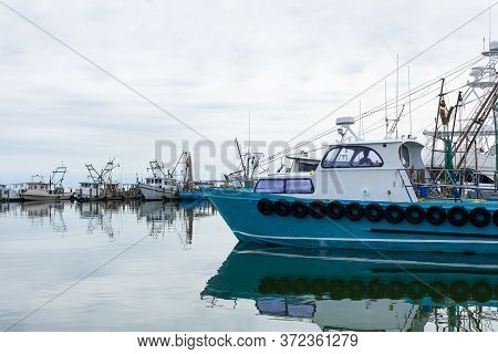 Boatyard, With Fishing Boats In The Gulf Of Mexico At Fulton, Texas, Usa