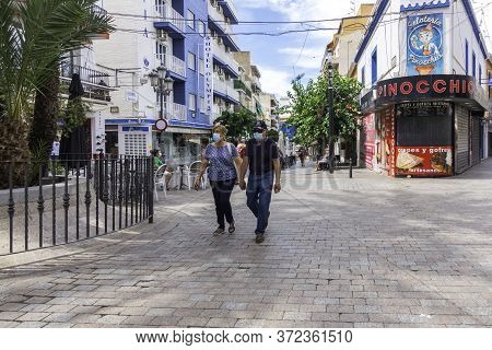 Benidorm, Spain, 14 June, 2020: People Walking On The Shopping Street In Benidorm. Popular Spanish R