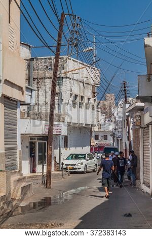 Muscat, Oman - February 23, 2017: Street Scene In Muttrah Neighborhood In Muscat, Oman