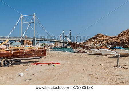 Fishing Boats In Sur, Oman. Khor Al Batar Bridge In The Background.