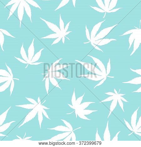 Seamless Pattern Of Cannabis Leaves On A Blue Background. White Hemp Leaves. Marijuanna Pattern