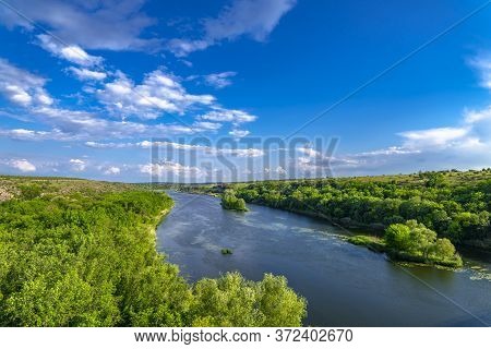 Southern Bug. Yuzhny Buh River Flow Through Green Trees. Nature Landscape
