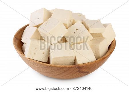 Heap Of Diced Tofu Cheese In Wooden Bowl Isolated On White Background With Clipping Path And Full De