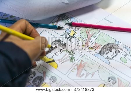Creator Drawing Storyboard Of Production Or Film Movie, Storyboarded  Consist Of Illustration Or Ima