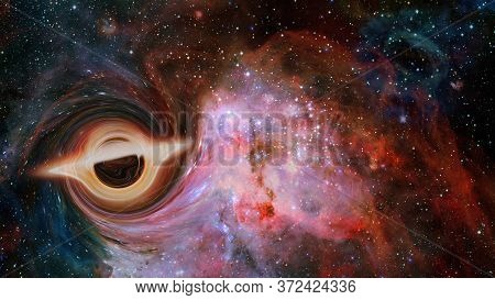 Simulation Of A Big Black Hole In The Dark Space. Elements Of This Image Furnished By Nasa.