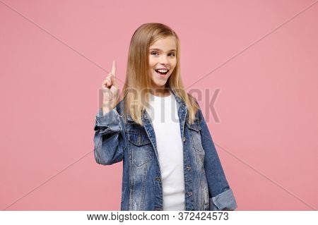 Excited Little Kid Girl 12-13 Years Old In Denim Jacket Isolated On Pastel Pink Background Children 